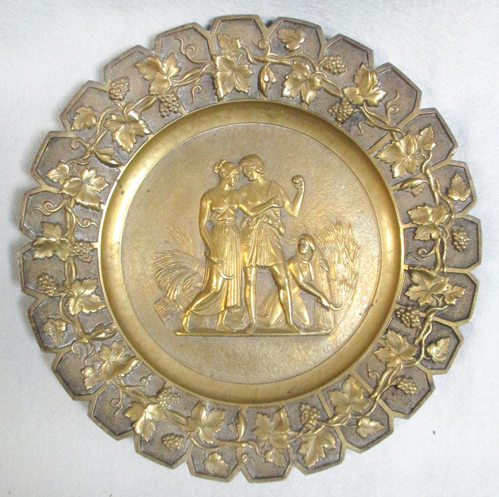 Four 19th century gilt bronze plates emblematic of the four seasons