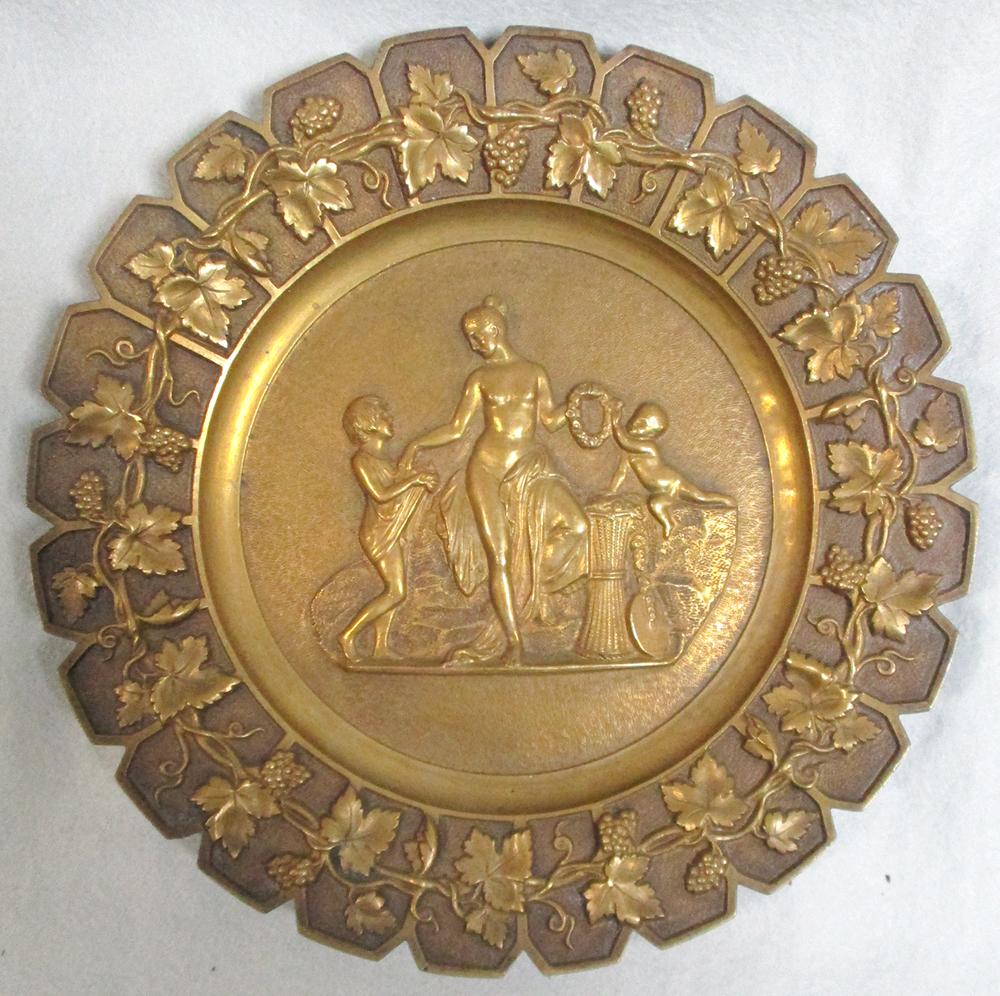Four 19th century gilt bronze plates emblematic of the four seasons
