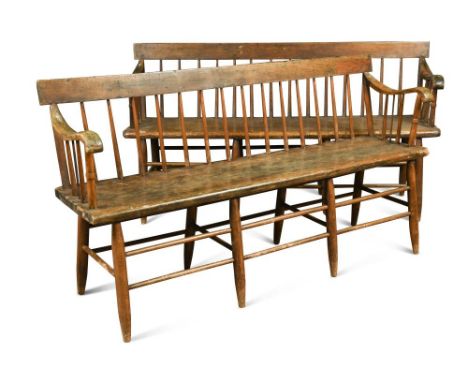 A pair of 19th century Tennessee ash Windsor porch or garden benches, with stick backs, solid seats and on pole turned stretc