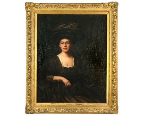 Circle of Sir John Lavery, RA (Irish, 1856-1941) Portrait of a lady, believed to be Mrs Collins, in a wide-brimmed hat trimme