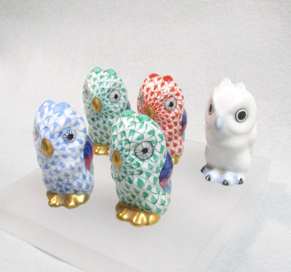 A collection of small Herend porcelain animals, to include two pairs of