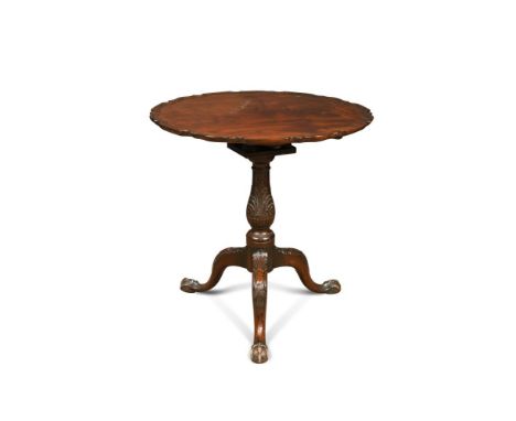 A George III and later mahogany tripod table, with pie-crust top and birdcage support, on a carved column and legs with pad f