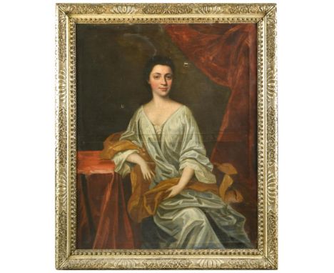 Circle of Sir John Medina (British, 1720-1796) Portrait of a lady, seated, in silver dress and gold cloak, three-quarter leng