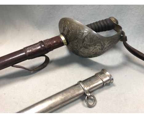 A George V 1912 pattern Cavalry sword, by Wilkinson Sword Compamy Ltd, London with leather and dress scabbards  