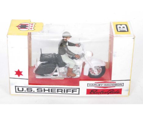 A Britains No.9692 US Sheriff Harley Davidson motorcycle and rider, housed in the original 360° window box