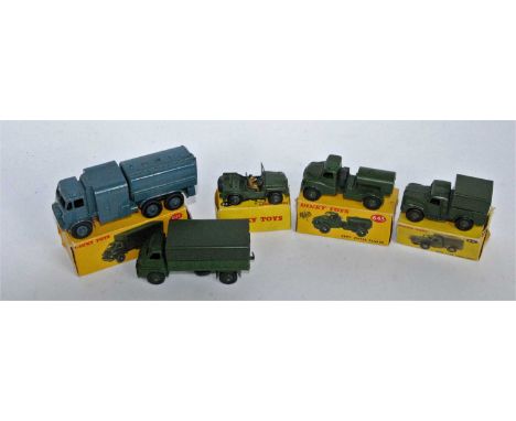 A collection of boxed and loose Dinky Toy Military diecasts to include No. 621 3 ton Army wagon, No. 641 1 ton Cargo truck, N