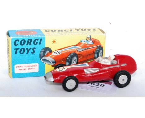 A Corgi Toys No. 150S Vanwall F1 Grand Prix race car, comprising of red body with racing No. 25, white driver figure and blan