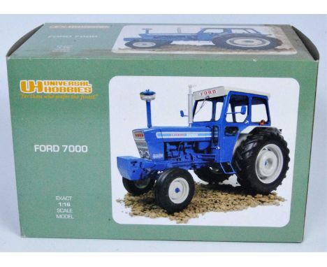 A Universal Hobbies 1/16 scale model No. UH2798 model of a Ford 7000 tractor, appears as issued in the original polystyrene p