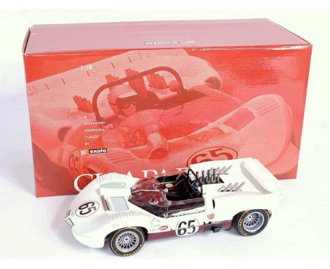 An Exoto Racing Legends No. RLG 181147 1/18 scale model of a Chaparral 2/2C 1965 LA Times Grand Prix winner, housed in the or