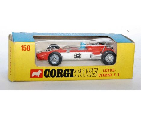 A Corgi Toys No. 158 Lotus Climax F1 race car comprising of orange and white body with blue driver and racing No.8 to sides a