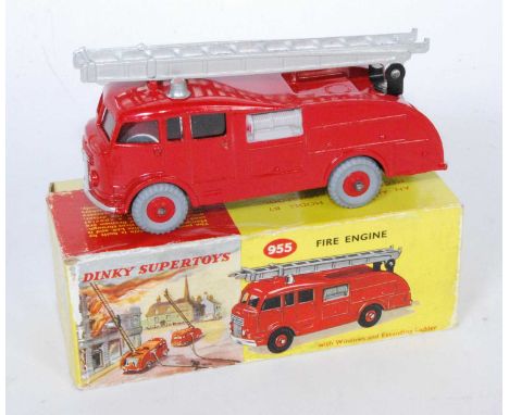 A Dinky Toys No.955 fire engine, comprising red body with red plastic hubs and silver ladder, with grey painted rollers to th