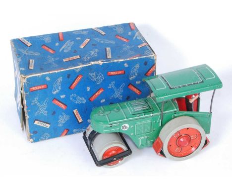 A Tippco No.517 tinplate and clockwork model of a diesel road roller, comprising of green body with red hubs and grey wheels,