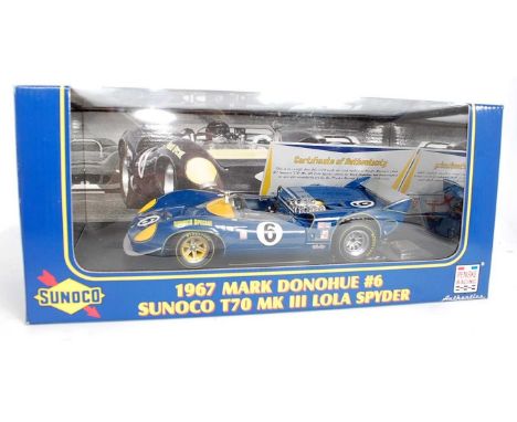 A GMP model No. 12005 1/18 scale boxed model of a 1967 Sunoco Special Lola Spider as driven by Mark Donohue with blue body an