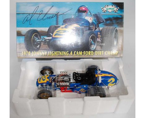 A GMP model No. 7901 1/12 scale model of a Johnny Lightning 4-Cam Ford Dirt Champion Spring Car as driven by Al Unser, housed