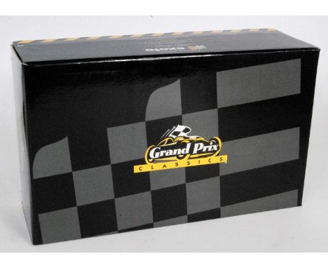 An Exoto Grand Prix Classics 1/18 scale model of a Gold Leaf Team Lotus Ford Type 49B race car comprising red and gold body w