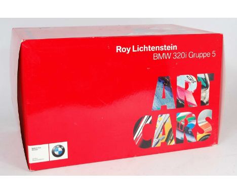 A Minichamps BMW Art Car Museum edition 1/18 scale model of a Roy Lichtenstein BMW 320i Gruppe 5, appears as issued in the or