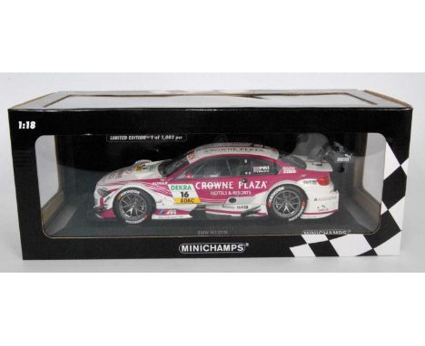 A Minichamps No. 132216 1/18 scale model of a BMW M3DTM 2013 BMW Team RMG DTM race car as driven by A Priaulx, finished in li