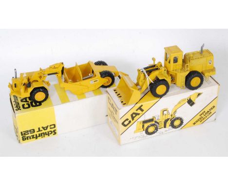 An NZG 1:50 scale Caterpillar Construction diecast group, to include a No.122 Caterpillar 621 wheel tractor-scraper, an NZG N