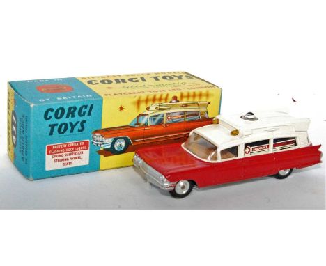 A Corgi Toys No. 437 Superior Ambulance comprising red and cream body with brown interior and spun hubs, with battery box to 