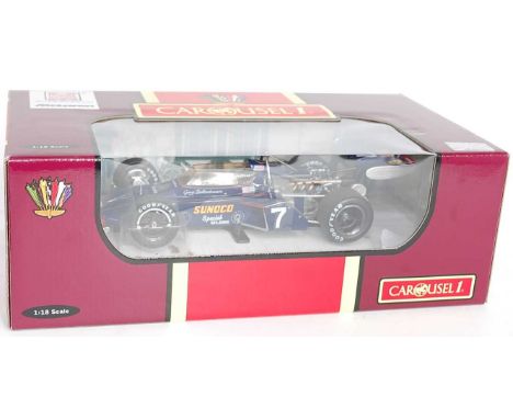 A Carousel 1 model No. 4823 1/18 scale Maclaren M16B 1972 Indy 500 race car, comprising of blue body with Sunoco Maclaren liv