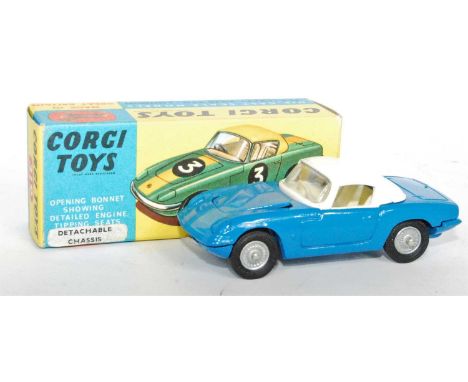 A Corgi Toys No. 319 Lotus Elan Coupe, comprising of blue body with white hood and off-white interior, finished with cast sil