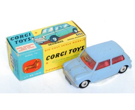 A Corgi Toys No. 226 Morris Mini Minor comprising of blue body with red interior and spun hubs housed in the original blue &a