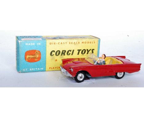 A Corgi Toys No. 215S Ford Thunderbird open sports car comprising red body with yellow interior and spun hubs, housed in the 