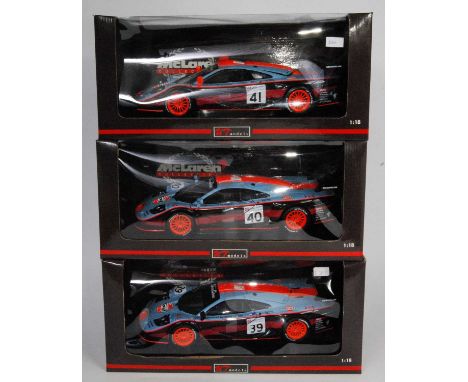 A UT Models 1.18 scale model Le Mans Maclaren F1 GTR boxed diecast group to include Ref. Nos. 39725, 39726, and 39727, all ap