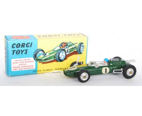 A Corgi Toys No. 155 Lotus Climax F1 Grand Prix racing car, comprising of green body with yellow racing stripe, Racing No. 1,