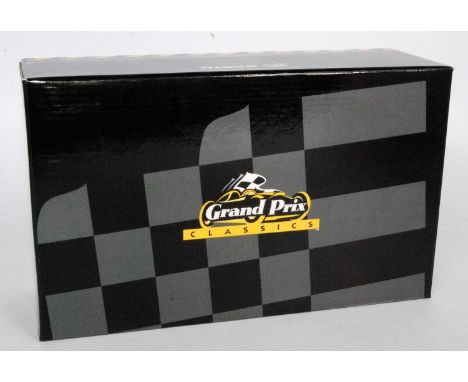 An Exoto Grand Prix Classics 1/18 scale boxed model of a Lotus Ford Type 49B Graham Hill race car, comprising red, white and 