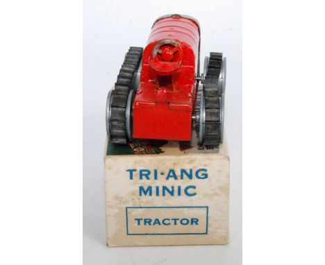 Triang Minic clockwork tractor with original key, complete with rubber tracks, key and original box (NM)