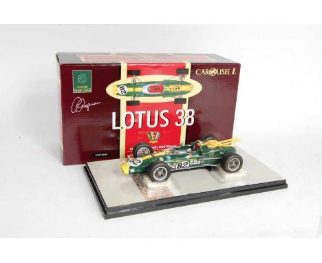 A Carousel 1 No. 5201 1/18 scale model of a Lotus 38 1965 Indy 500 winner race car, finished in green and yellow with racing 