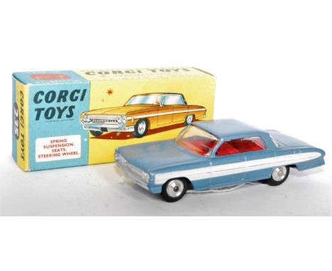 A Corgi Toys No. 235 Oldsmobile Super 88 saloon comprising metallic blue body with white side flash and spun hubs, finished w