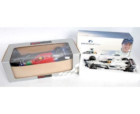 A UT Models 1/18 scale F1 racing car box diecast group to include a BMW Williams F1 Team, BMW FW22 Ralf Schumacher race car, 