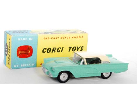 A Corgi Toys No. 214 Ford Thunderbird saloon comprising of pale green body with cream hood and spun hubs, housed in the origi