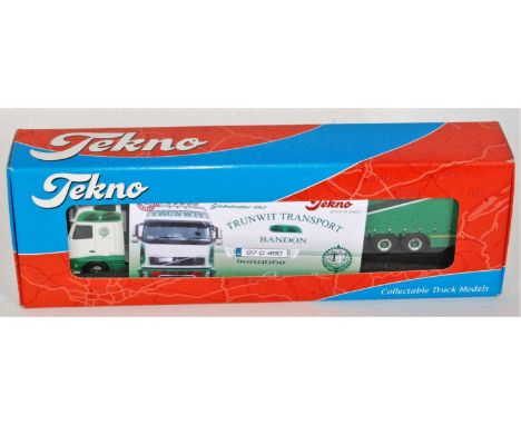 A Tekno 1/50 scale boxed model of a Trunwit Transport 1/50 scale model of a Scania 480 Globetrotter tractor unit with curtain