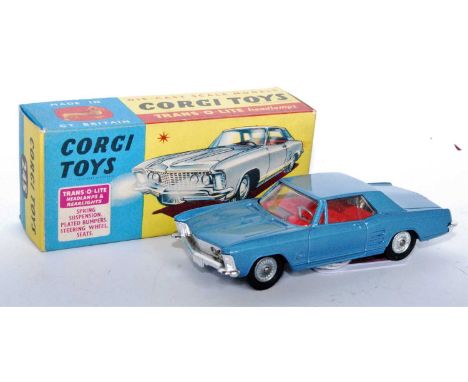 A Corgi Toys No. 245 Buick Riviera, comprising of metallic blue body with red interior and cast hubs, housed in the original 