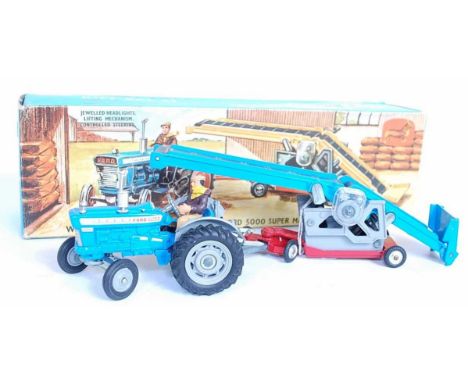 A Corgi Toys gift set 47 comprising of Ford 5000 Super Major tractor and driver figure together with working conveyor on trai