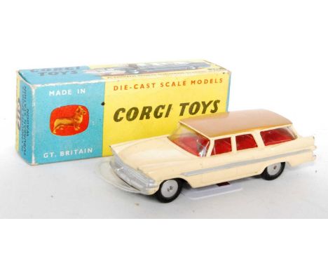 A Corgi Toys No. 219 Plymouth sports suburban station wagon, comprising yellow body with silver side flash and brown roof wit