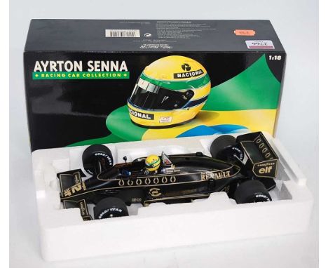A Minichamps Model No. 540861812 1/18 scale model of a Lotus Renault 98T 1986 F1 race car, appears as issued in the original 