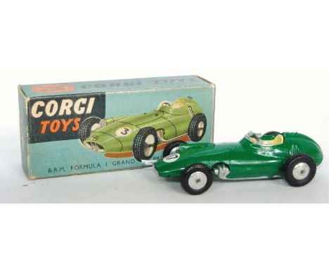 A Corgi Toys No. 152 BRM F1 Grand Prix race car comprising of dark green body with lemon interior and spun hubs, model has po