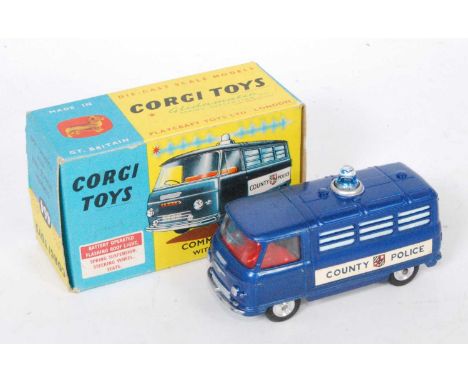 A Corgi Toys No.464 Commer Police van, comprising of light blue metallic body with red interior, blue roof light and spun hub