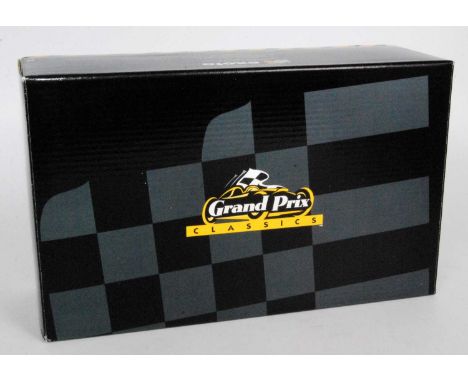 An Exoto Grand Prix Classics 1/18 scale model of a Graham Hill Team Lotus Lotus Ford type 49 F1 race car comprising green and