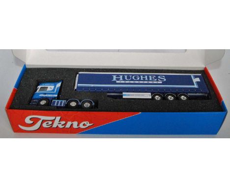 A Tekno 1/50 scale boxed model of a Scania R560 6x2 tractor unit with refrigerated curtainside Hughes Transport trailer, hous