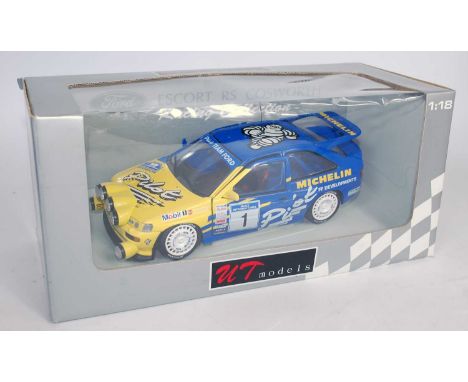 A Solido, Minichamps and UT Models 1/18 scale WRC and Rally car diecast group to include a Solido Peugeot 206 1999 WRC race c