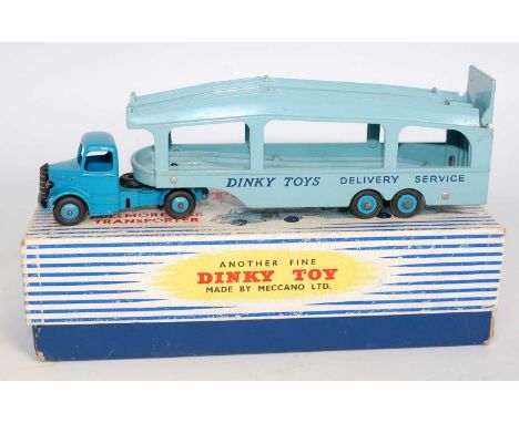 A Dinky Toys No. 582 Pullmore Car Transporter comprising of dark blue cab and chassis with light blue back and Supertoys hubs