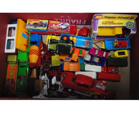 One box containing a quantity of various boxed and loose mixed issue Matchbox diecasts to include 1/75 series, Superfasts Kin