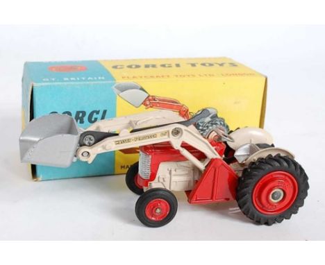 A Corgi Toys No. 53 Massey Ferguson 65 tractor with shovel comprising of red and cream body with red cast hubs and silver buc