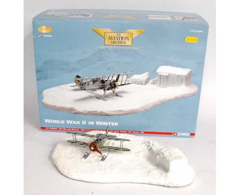 A Corgi Aviation Archive 1/72 scale, model No. AA36204, WWII in Winter J-8A Gladiator with Skis and Diorama, appears as issue