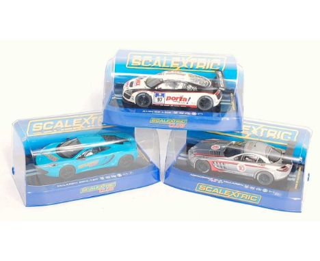 Three various plastic cased, as issued, Scalextric/Hornby slot cars, to include Ref. Nos. C3327 Scalextric Club 2012 Maclaren